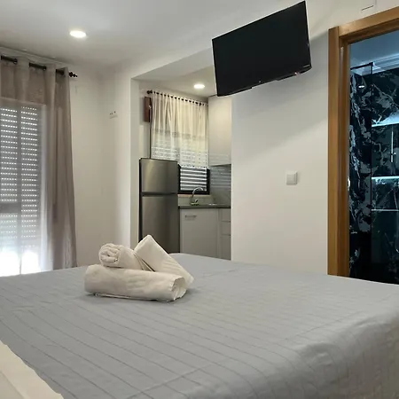 E Quartos Primorosa Apartman *